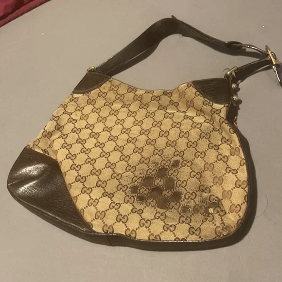 Authentic well used good condition Gucci medium hobo logo purse